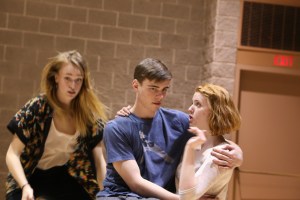 Sonder cast rehearses family scene.  Erin Pettifor as the mother comforts her children (Julia Van Dam, Evan Macleod).  